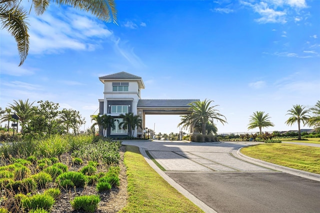 16127 Fortezza Dr, Bradenton, FL 34211 - view of front facade featuring driveway and stucco siding