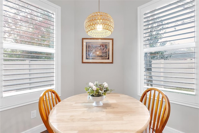 dining room with a notable chandelier