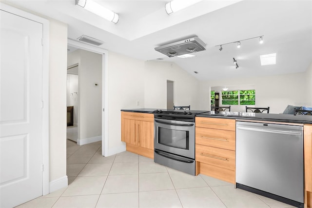 kitchen with light tile patterned floors, light brown cabinets, and appliances with stainless steel finishes