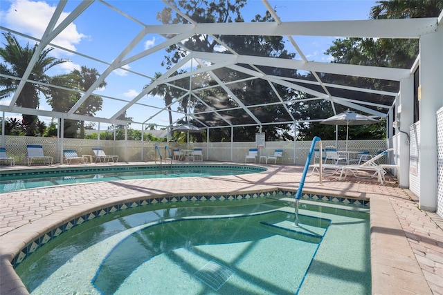 view of pool featuring a patio area and a lanai