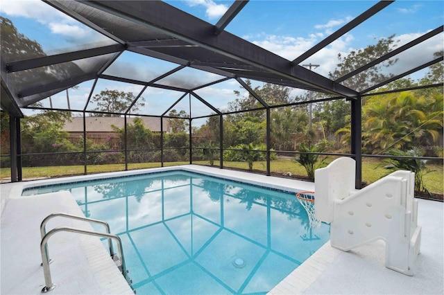 view of pool featuring a lanai