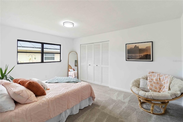 carpeted bedroom with a closet