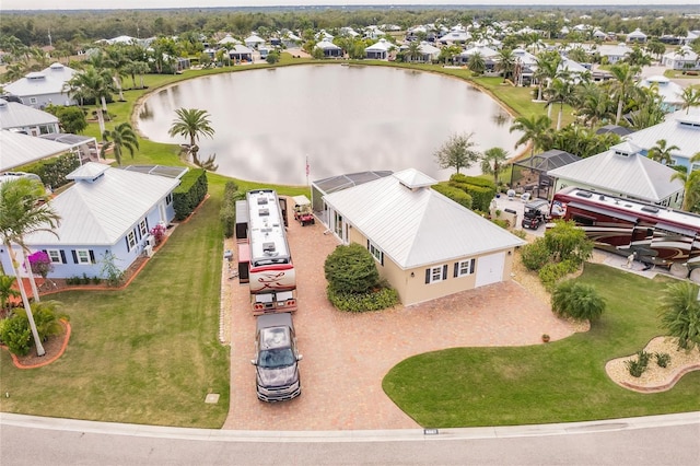 bird's eye view with a water view