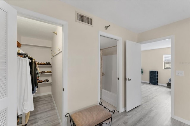 hallway featuring light hardwood / wood-style floors