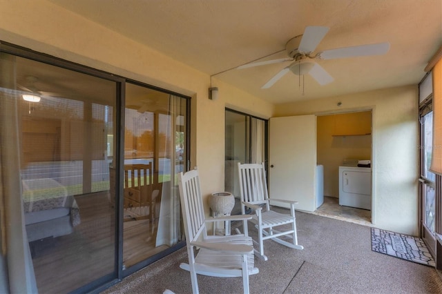 sunroom featuring ceiling fan