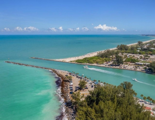 aerial view featuring a water view and a beach view