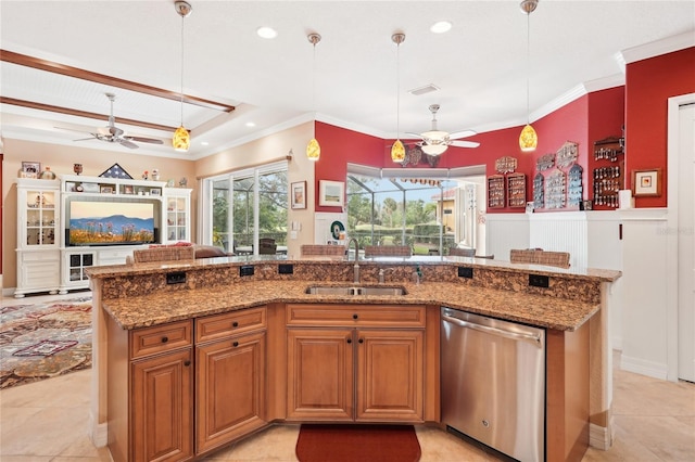 kitchen featuring light stone countertops, dishwasher, sink, hanging light fixtures, and ornamental molding