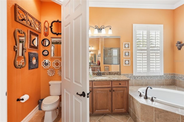 bathroom featuring tiled bath, toilet, tile patterned flooring, crown molding, and vanity