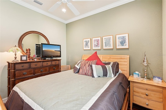 bedroom featuring ceiling fan and ornamental molding