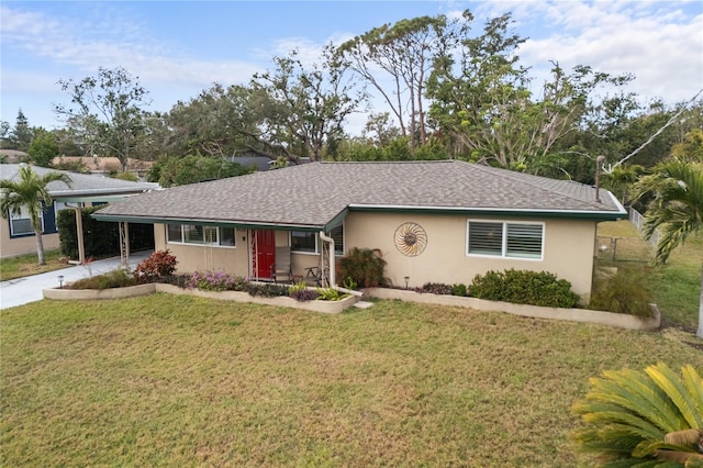 single story home with a front yard