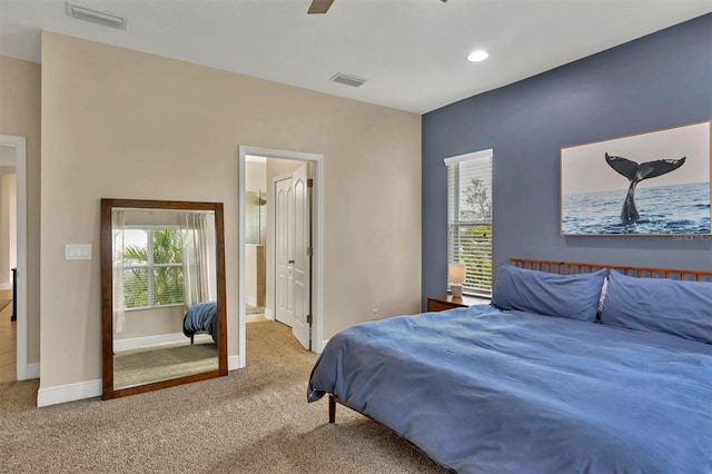 carpeted bedroom with ceiling fan