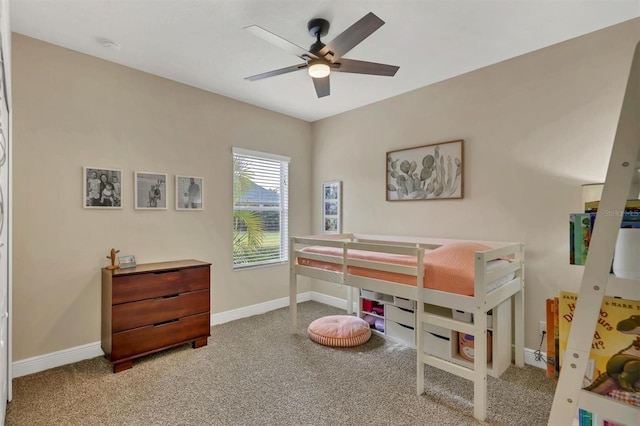 carpeted bedroom featuring ceiling fan