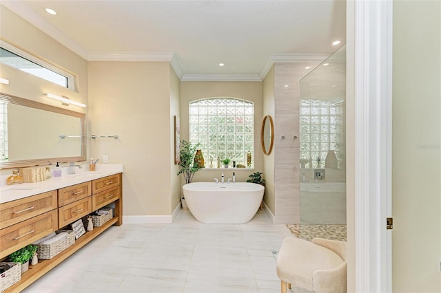 bathroom with vanity, ornamental molding, and independent shower and bath