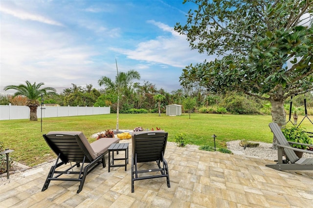 view of patio / terrace with a storage unit