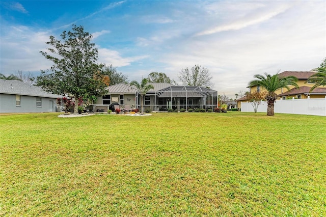 view of yard featuring a lanai