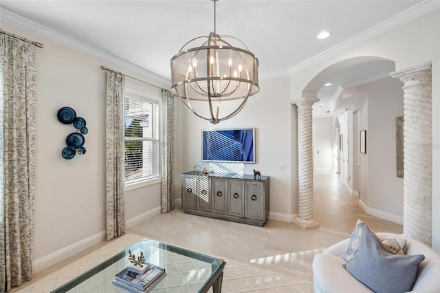 living room featuring decorative columns, light tile patterned floors, ornamental molding, and an inviting chandelier