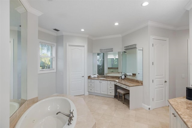 bathroom with a relaxing tiled tub, vanity, and crown molding