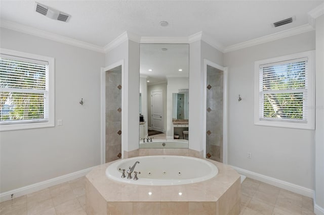 bathroom with plus walk in shower, crown molding, and tile patterned floors