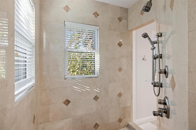 bathroom featuring a tile shower