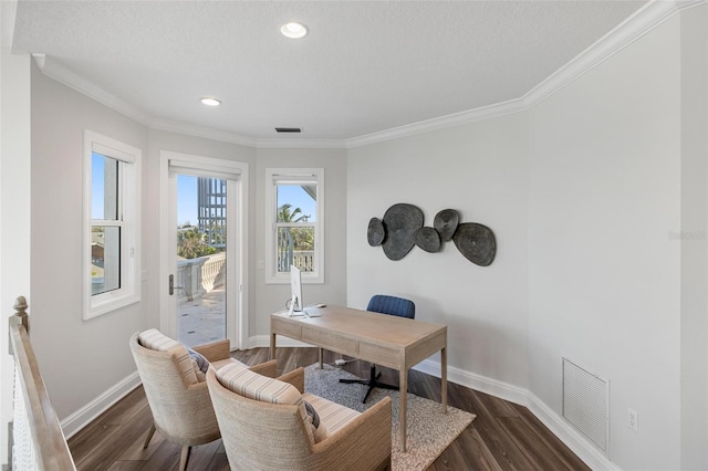 office area with dark hardwood / wood-style floors, crown molding, and a textured ceiling