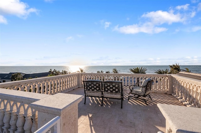 view of patio / terrace featuring a water view