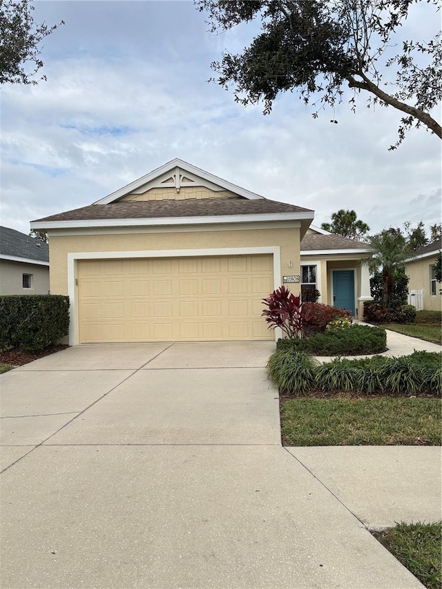 single story home featuring a garage