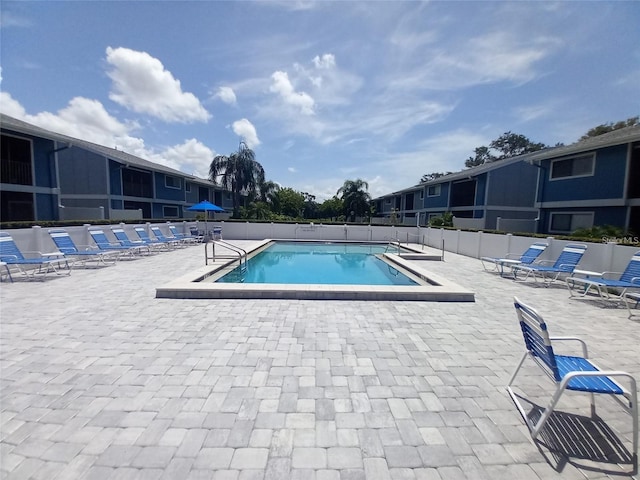 view of pool with a patio