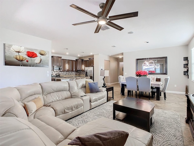 living room with ceiling fan