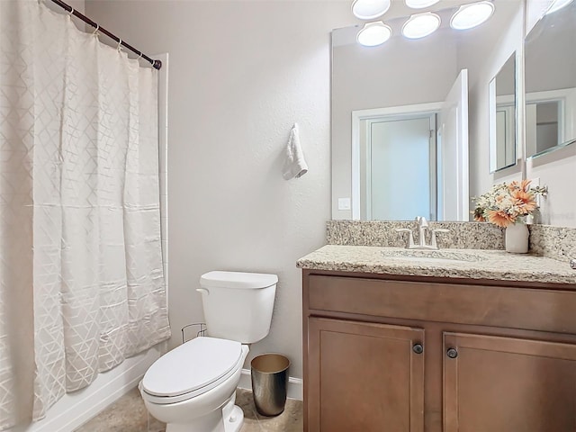 full bathroom with vanity, toilet, and shower / bath combo with shower curtain