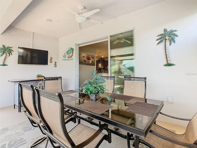 dining space featuring ceiling fan