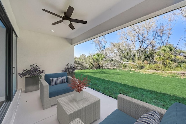 view of patio featuring ceiling fan and an outdoor living space