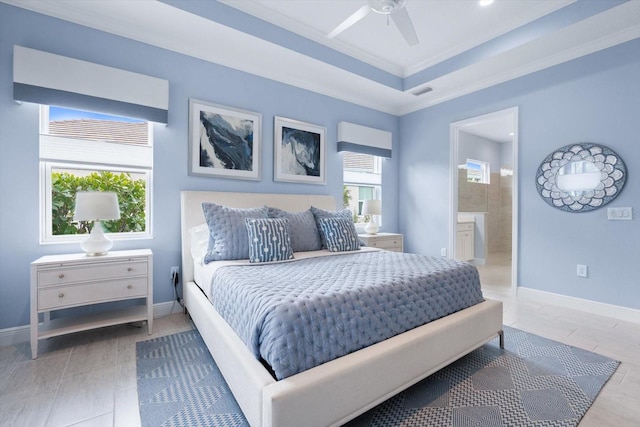 bedroom featuring ensuite bathroom, ceiling fan, and ornamental molding