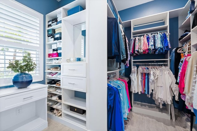 spacious closet with light wood-type flooring