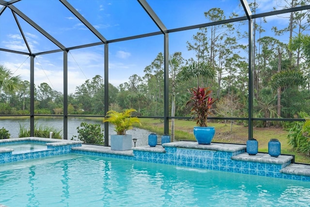 view of swimming pool featuring an in ground hot tub, a lanai, and a water view