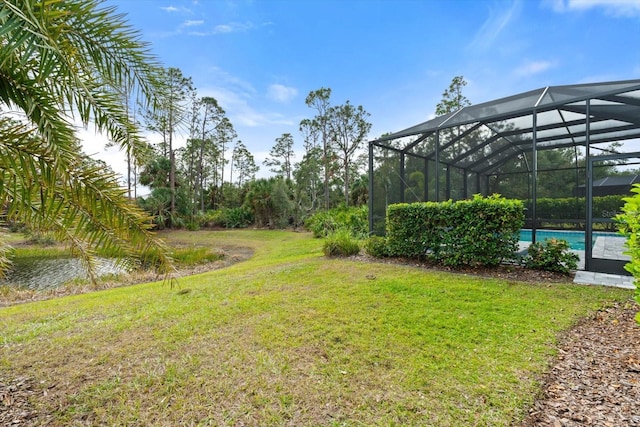 view of yard featuring a lanai