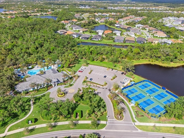 drone / aerial view with a water view