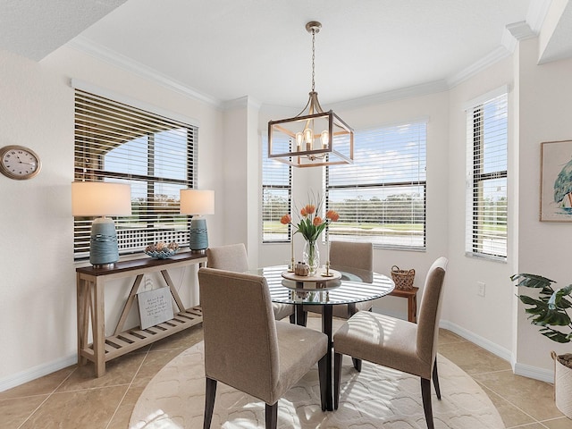 dining space featuring ornamental molding, an inviting chandelier, and light tile patterned flooring