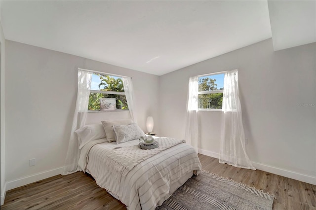 bedroom featuring hardwood / wood-style flooring