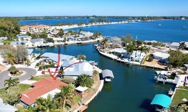 birds eye view of property featuring a water view