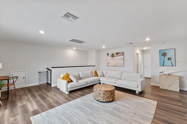 living room with wood-type flooring