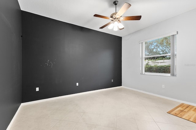 empty room featuring ceiling fan