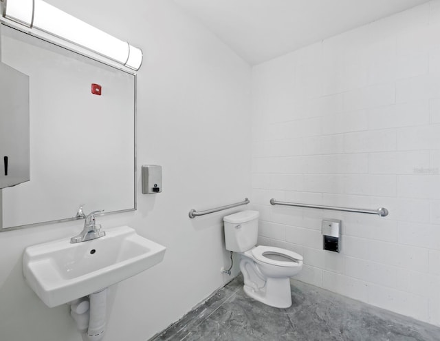 half bathroom with toilet and a sink