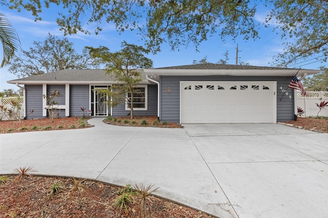 single story home featuring a garage