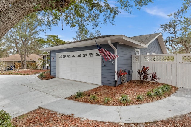 exterior space with a garage