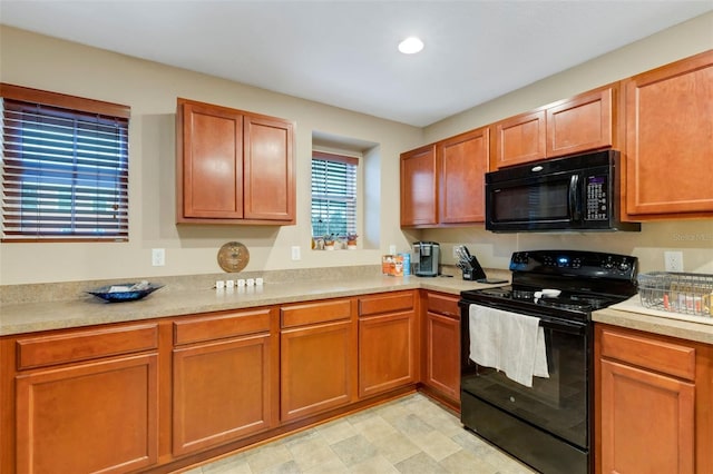 kitchen featuring black appliances