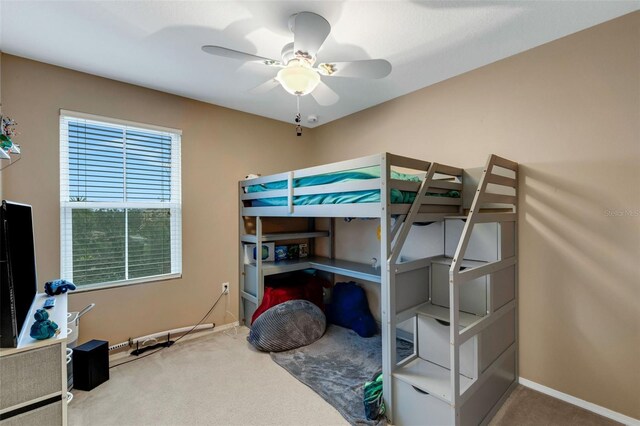 bedroom featuring carpet floors and ceiling fan