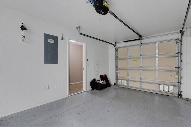 garage with a garage door opener and electric panel