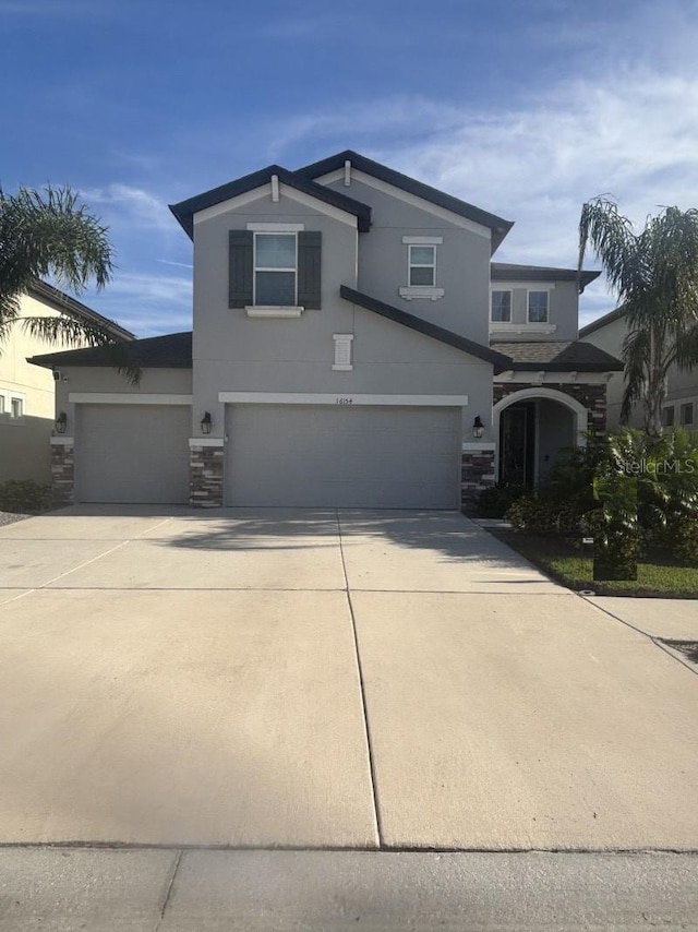 front of property featuring a garage