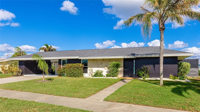 ranch-style house with a front lawn and a carport