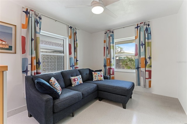 living room featuring ceiling fan